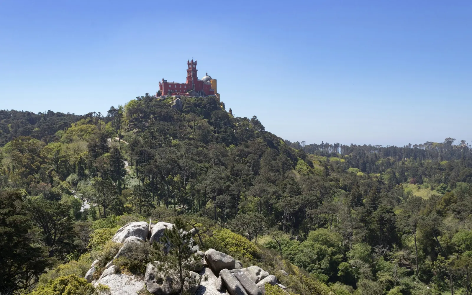 Pena Palace seen from the Moorish Castle walls on the neighbouring peak