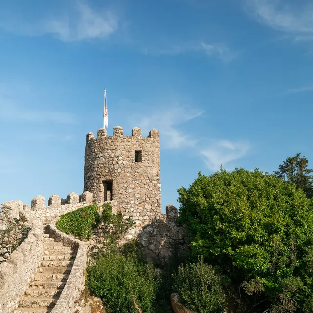 Stone steps climbing to a tower on the battlements of the Castelo dos Mouros